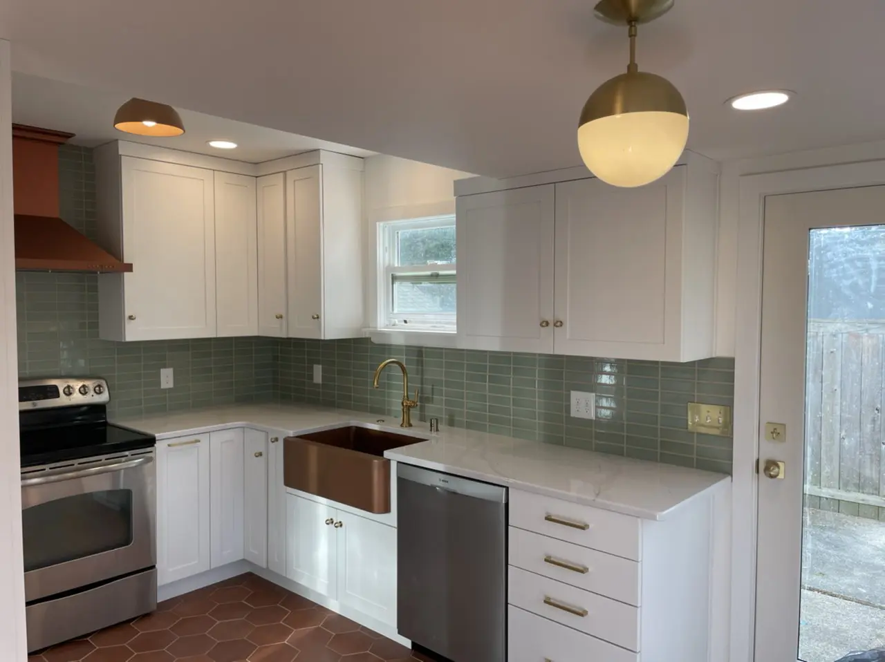 Collage of AmyWorks kitchen remodeling projects showcasing modern updated kitchens